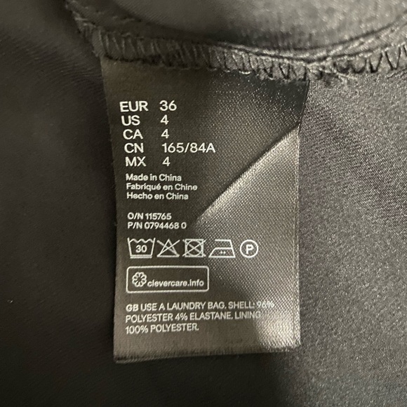 Black flowy dress with a deep neck and tie from H & M in size UK 8 - Picture 5 of 5